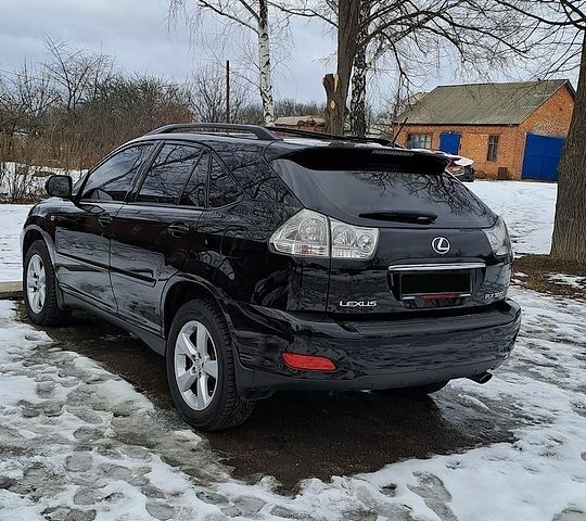 Чорний Лексус РХ, об'ємом двигуна 3.46 л та пробігом 200 тис. км за 17000 $, фото 4 на Automoto.ua