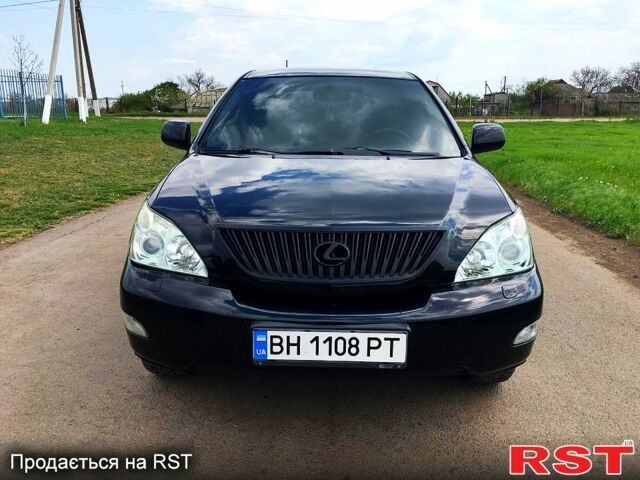 Черный Лексус РХ, объемом двигателя 3.5 л и пробегом 245 тыс. км за 10500 $, фото 1 на Automoto.ua