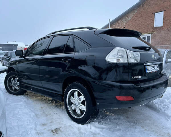 Черный Лексус РХ, объемом двигателя 3.5 л и пробегом 306 тыс. км за 11300 $, фото 5 на Automoto.ua
