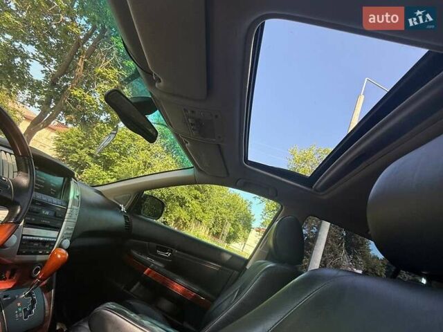 Черный Лексус РХ, объемом двигателя 3.5 л и пробегом 181 тыс. км за 12500 $, фото 14 на Automoto.ua