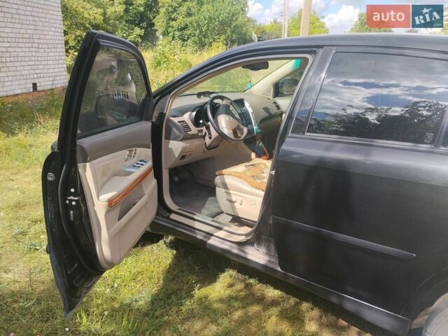 Чорний Лексус РХ, об'ємом двигуна 3.46 л та пробігом 265 тис. км за 12000 $, фото 7 на Automoto.ua