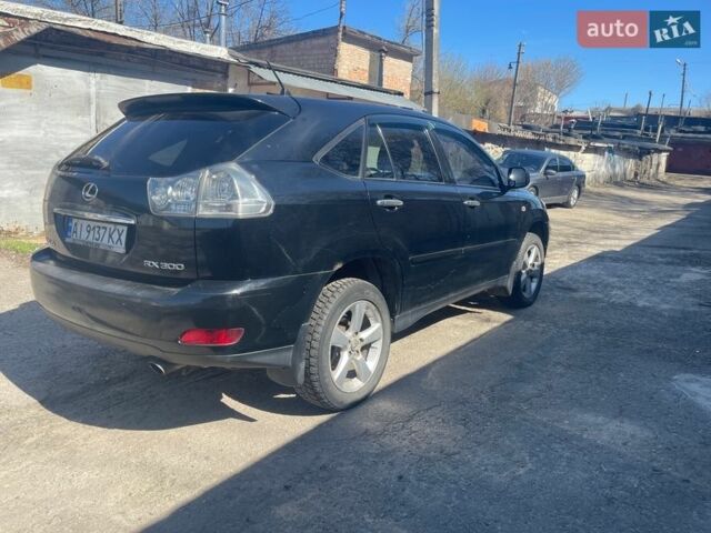Черный Лексус РХ, объемом двигателя 3 л и пробегом 250 тыс. км за 5200 $, фото 4 на Automoto.ua