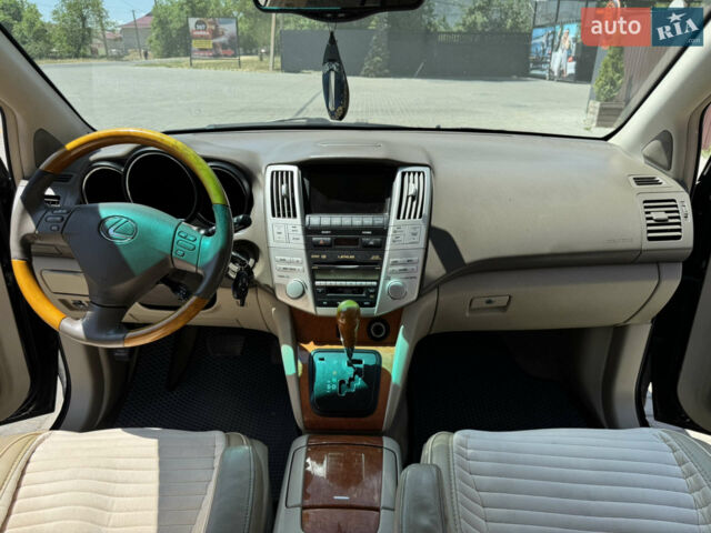 Черный Лексус РХ, объемом двигателя 3.46 л и пробегом 189 тыс. км за 9800 $, фото 5 на Automoto.ua
