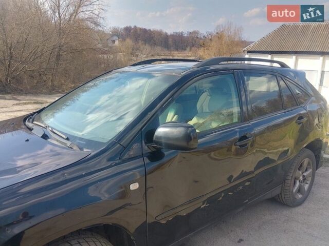Черный Лексус РХ, объемом двигателя 3 л и пробегом 265 тыс. км за 6100 $, фото 11 на Automoto.ua