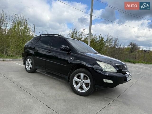 Черный Лексус РХ, объемом двигателя 3.5 л и пробегом 183 тыс. км за 11200 $, фото 23 на Automoto.ua