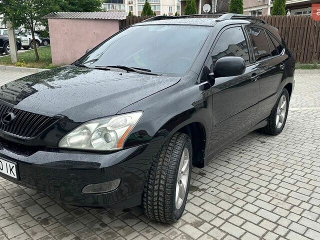 Черный Лексус РХ, объемом двигателя 3.46 л и пробегом 285 тыс. км за 9500 $, фото 1 на Automoto.ua