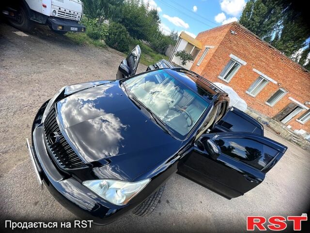 Черный Лексус РХ, объемом двигателя 3.5 л и пробегом 340 тыс. км за 11200 $, фото 1 на Automoto.ua