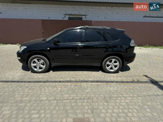 Черный Лексус РХ, объемом двигателя 3.46 л и пробегом 185 тыс. км за 10000 $, фото 1 на Automoto.ua