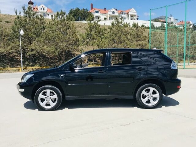 Черный Лексус РХ, объемом двигателя 3.3 л и пробегом 270 тыс. км за 10950 $, фото 1 на Automoto.ua