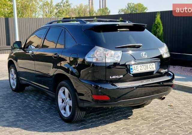 Чорний Лексус РХ, об'ємом двигуна 3.46 л та пробігом 262 тис. км за 11400 $, фото 3 на Automoto.ua