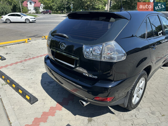 Чорний Лексус РХ, об'ємом двигуна 3 л та пробігом 317 тис. км за 9500 $, фото 4 на Automoto.ua
