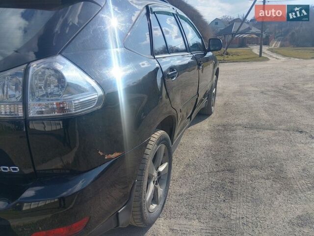 Черный Лексус РХ, объемом двигателя 3 л и пробегом 265 тыс. км за 6100 $, фото 7 на Automoto.ua