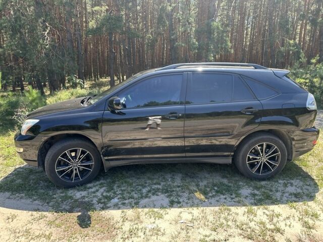 Черный Лексус РХ, объемом двигателя 3.3 л и пробегом 300 тыс. км за 11203 $, фото 1 на Automoto.ua