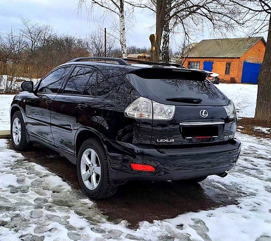 Черный Лексус РХ, объемом двигателя 3.5 л и пробегом 200 тыс. км за 17000 $, фото 1 на Automoto.ua