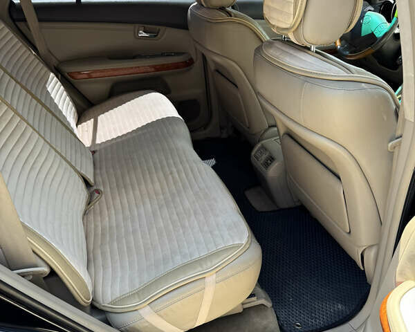 Черный Лексус РХ, объемом двигателя 3.46 л и пробегом 189 тыс. км за 10200 $, фото 7 на Automoto.ua