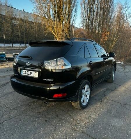 Чорний Лексус РХ, об'ємом двигуна 3.46 л та пробігом 200 тис. км за 11200 $, фото 1 на Automoto.ua