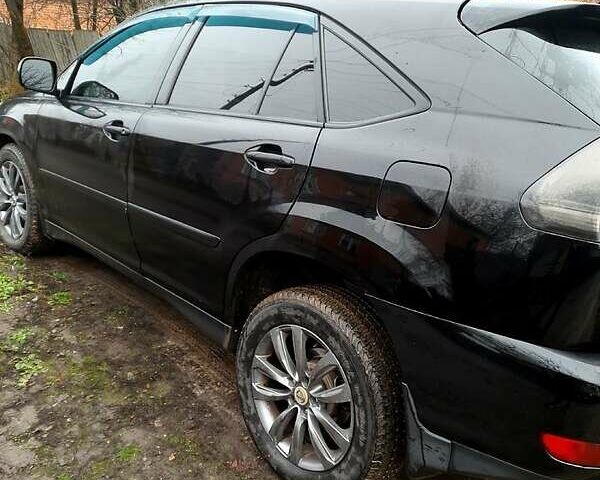 Черный Лексус РХ, объемом двигателя 3.3 л и пробегом 289 тыс. км за 11700 $, фото 1 на Automoto.ua