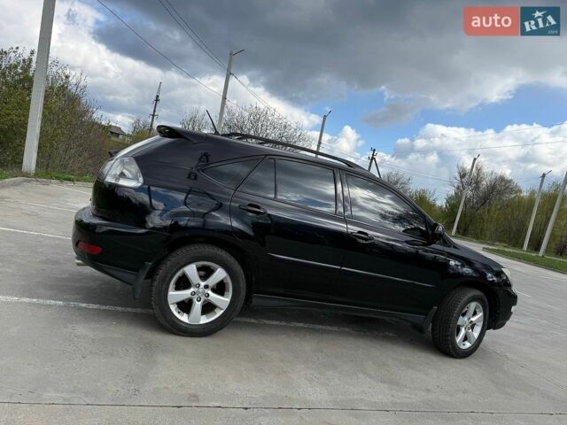 Черный Лексус РХ, объемом двигателя 3.5 л и пробегом 183 тыс. км за 11200 $, фото 28 на Automoto.ua
