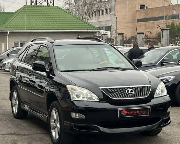 Черный Лексус РХ, объемом двигателя 3.46 л и пробегом 220 тыс. км за 11500 $, фото 1 на Automoto.ua