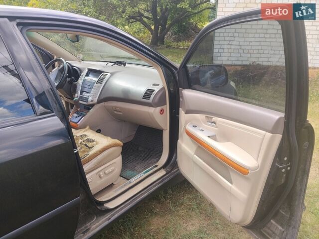 Чорний Лексус РХ, об'ємом двигуна 3.46 л та пробігом 265 тис. км за 12000 $, фото 12 на Automoto.ua