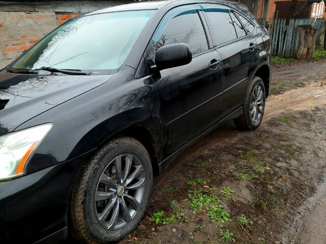 Черный Лексус РХ, объемом двигателя 3.3 л и пробегом 289 тыс. км за 11700 $, фото 1 на Automoto.ua