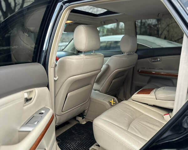 Черный Лексус РХ, объемом двигателя 3.5 л и пробегом 306 тыс. км за 11300 $, фото 8 на Automoto.ua