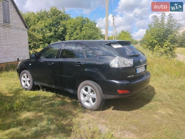Чорний Лексус РХ, об'ємом двигуна 3.46 л та пробігом 265 тис. км за 12000 $, фото 3 на Automoto.ua