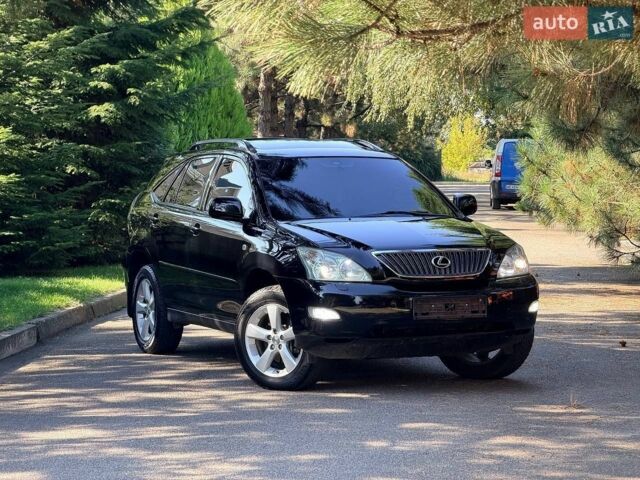 Черный Лексус РХ, объемом двигателя 3.5 л и пробегом 180 тыс. км за 10350 $, фото 1 на Automoto.ua