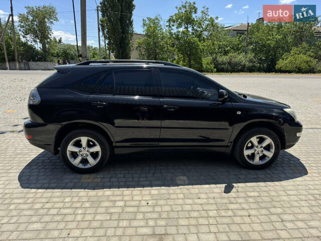 Черный Лексус РХ, объемом двигателя 3.46 л и пробегом 185 тыс. км за 10000 $, фото 3 на Automoto.ua