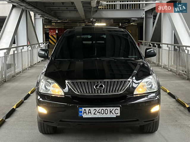 Черный Лексус РХ, объемом двигателя 3.46 л и пробегом 270 тыс. км за 11200 $, фото 1 на Automoto.ua