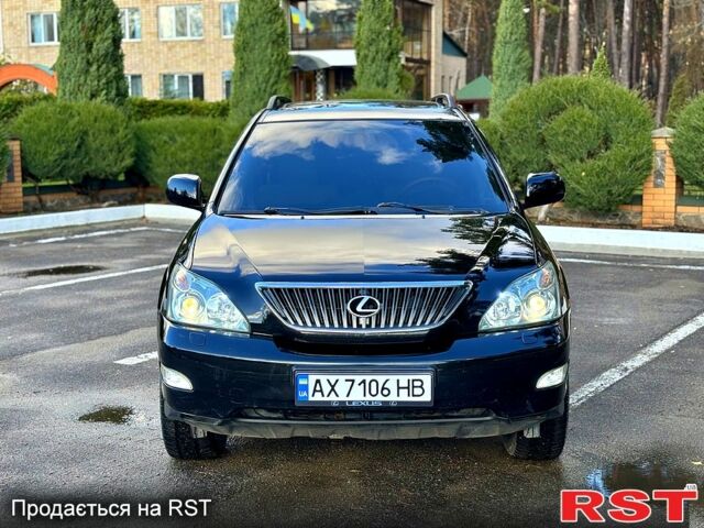 Черный Лексус РХ, объемом двигателя 3.5 л и пробегом 194 тыс. км за 12700 $, фото 1 на Automoto.ua