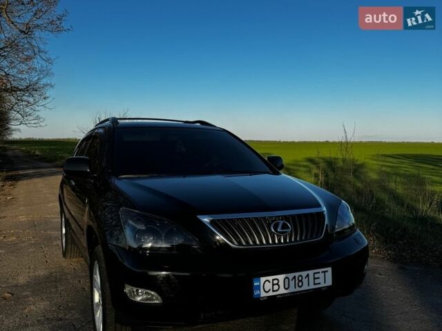 Черный Лексус РХ, объемом двигателя 3.46 л и пробегом 239 тыс. км за 11999 $, фото 1 на Automoto.ua