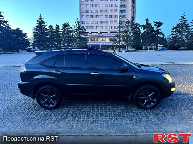 Черный Лексус РХ, объемом двигателя 3.5 л и пробегом 247 тыс. км за 9999 $, фото 2 на Automoto.ua