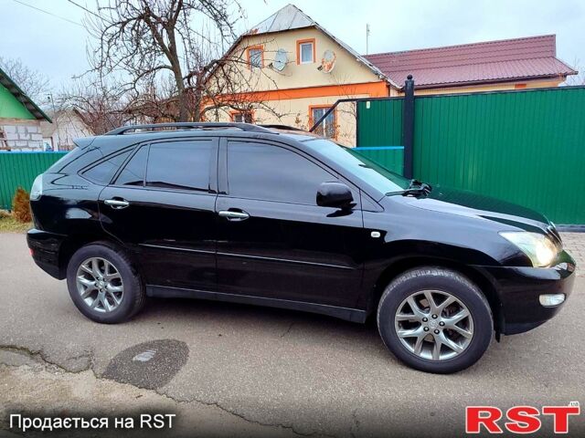 Черный Лексус РХ, объемом двигателя 3.5 л и пробегом 212 тыс. км за 11300 $, фото 1 на Automoto.ua