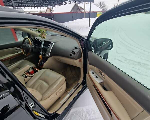 Черный Лексус РХ, объемом двигателя 3.46 л и пробегом 161 тыс. км за 11500 $, фото 17 на Automoto.ua