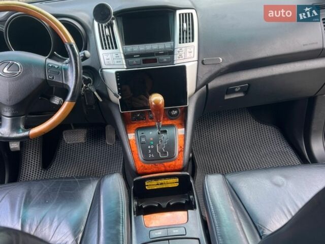 Черный Лексус РХ, объемом двигателя 3.46 л и пробегом 240 тыс. км за 11700 $, фото 9 на Automoto.ua