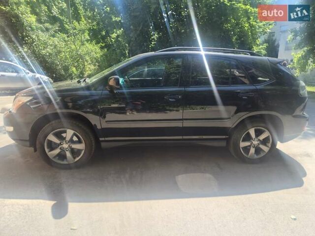 Черный Лексус РХ, объемом двигателя 3.46 л и пробегом 170 тыс. км за 11500 $, фото 2 на Automoto.ua