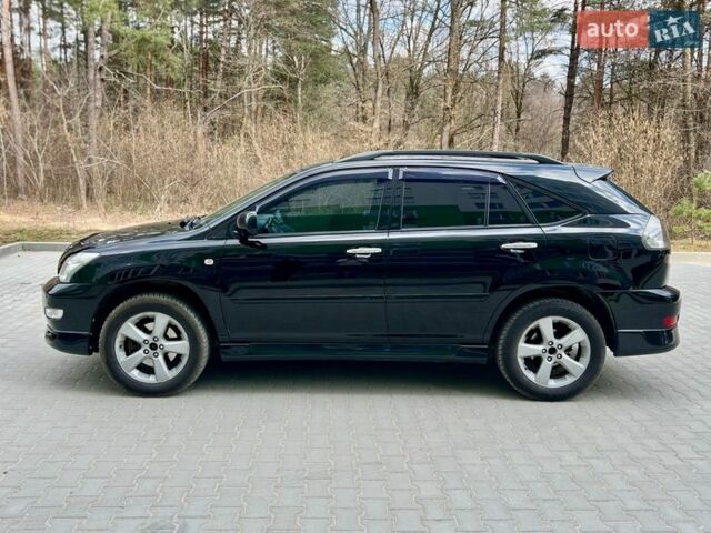 Черный Лексус РХ, объемом двигателя 3.5 л и пробегом 260 тыс. км за 12500 $, фото 4 на Automoto.ua