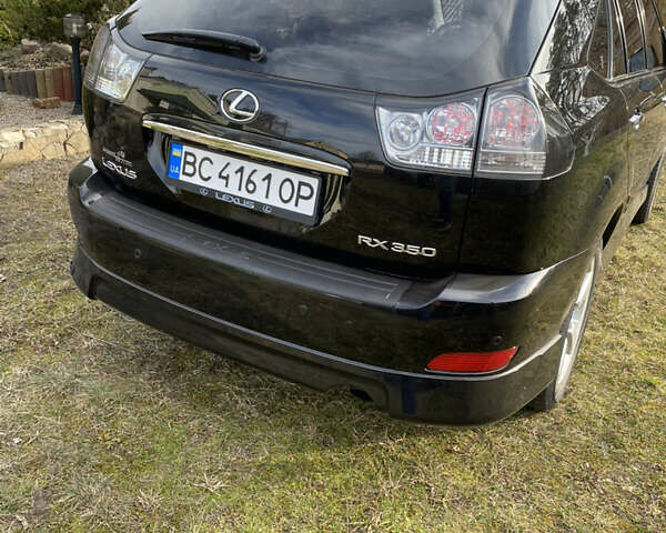 Черный Лексус РХ, объемом двигателя 3.46 л и пробегом 167 тыс. км за 13800 $, фото 3 на Automoto.ua