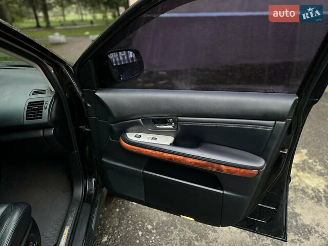 Чорний Лексус РХ, об'ємом двигуна 3.46 л та пробігом 217 тис. км за 14500 $, фото 49 на Automoto.ua