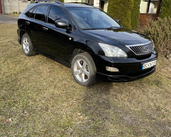 Черный Лексус РХ, объемом двигателя 3.46 л и пробегом 167 тыс. км за 13800 $, фото 1 на Automoto.ua