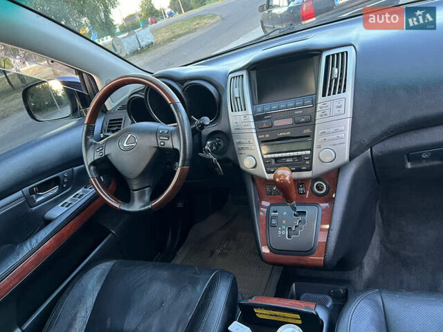 Чорний Лексус РХ, об'ємом двигуна 3.46 л та пробігом 205 тис. км за 10800 $, фото 14 на Automoto.ua