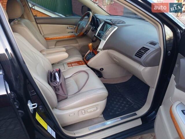 Черный Лексус РХ, объемом двигателя 3.46 л и пробегом 372 тыс. км за 10800 $, фото 3 на Automoto.ua