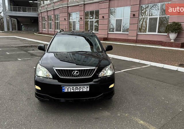 Черный Лексус РХ, объемом двигателя 3.5 л и пробегом 200 тыс. км за 11400 $, фото 1 на Automoto.ua