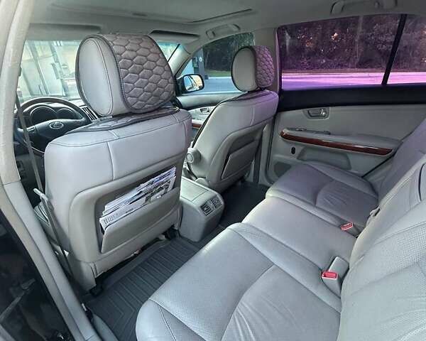Черный Лексус РХ, объемом двигателя 3.46 л и пробегом 242 тыс. км за 14000 $, фото 21 на Automoto.ua