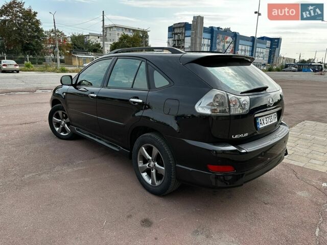 Черный Лексус РХ, объемом двигателя 3.46 л и пробегом 247 тыс. км за 11400 $, фото 4 на Automoto.ua