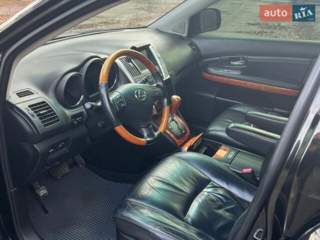 Черный Лексус РХ, объемом двигателя 3.46 л и пробегом 240 тыс. км за 11700 $, фото 5 на Automoto.ua