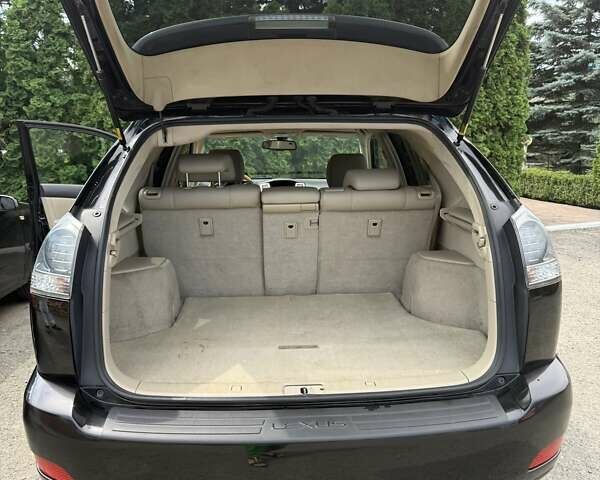 Черный Лексус РХ, объемом двигателя 3.31 л и пробегом 160 тыс. км за 12500 $, фото 1 на Automoto.ua