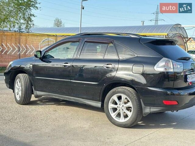 Черный Лексус РХ, объемом двигателя 3.46 л и пробегом 318 тыс. км за 13700 $, фото 3 на Automoto.ua