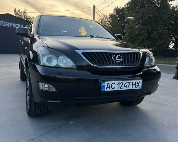 Чорний Лексус РХ, об'ємом двигуна 3.46 л та пробігом 205 тис. км за 10800 $, фото 1 на Automoto.ua